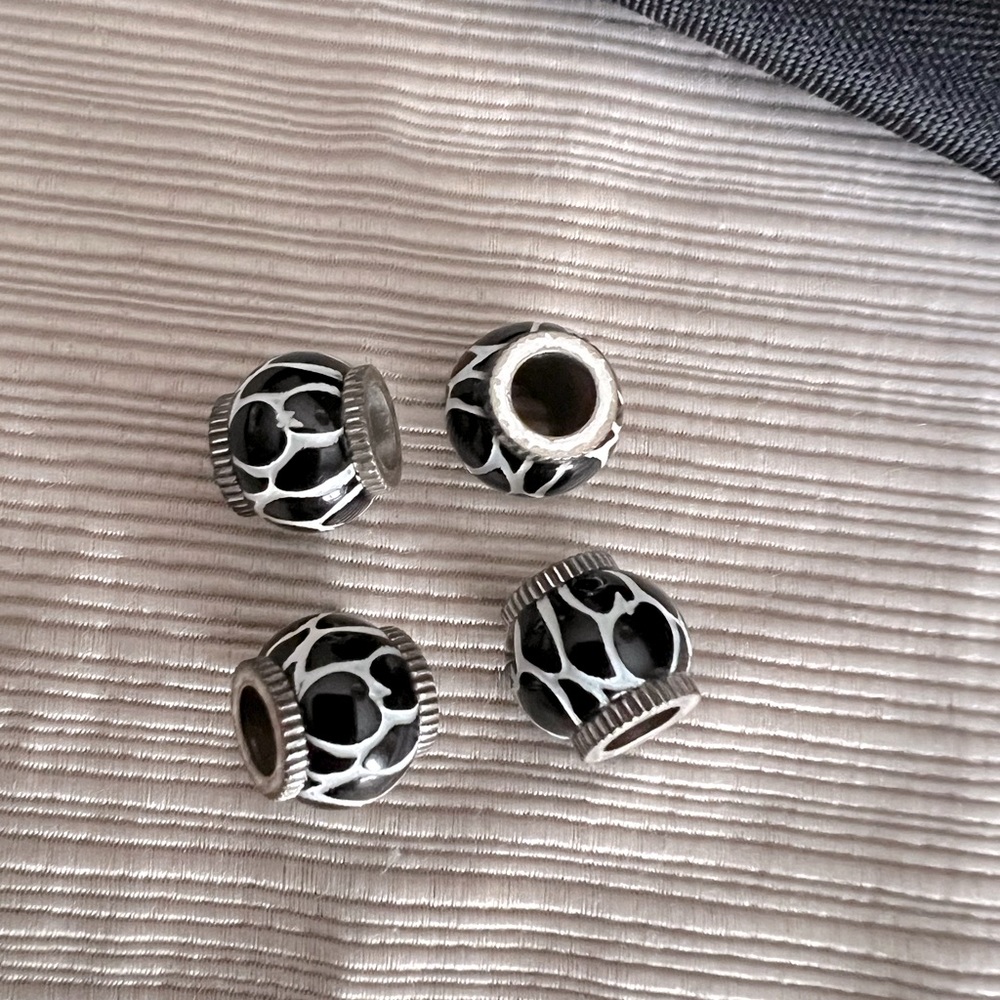 Brighton charm separators. Black & white beads. Looks great w/o or with charms